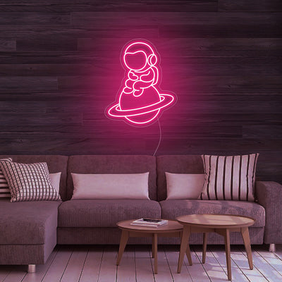 Astronaut Sitting on Planet - LED Neon Sign