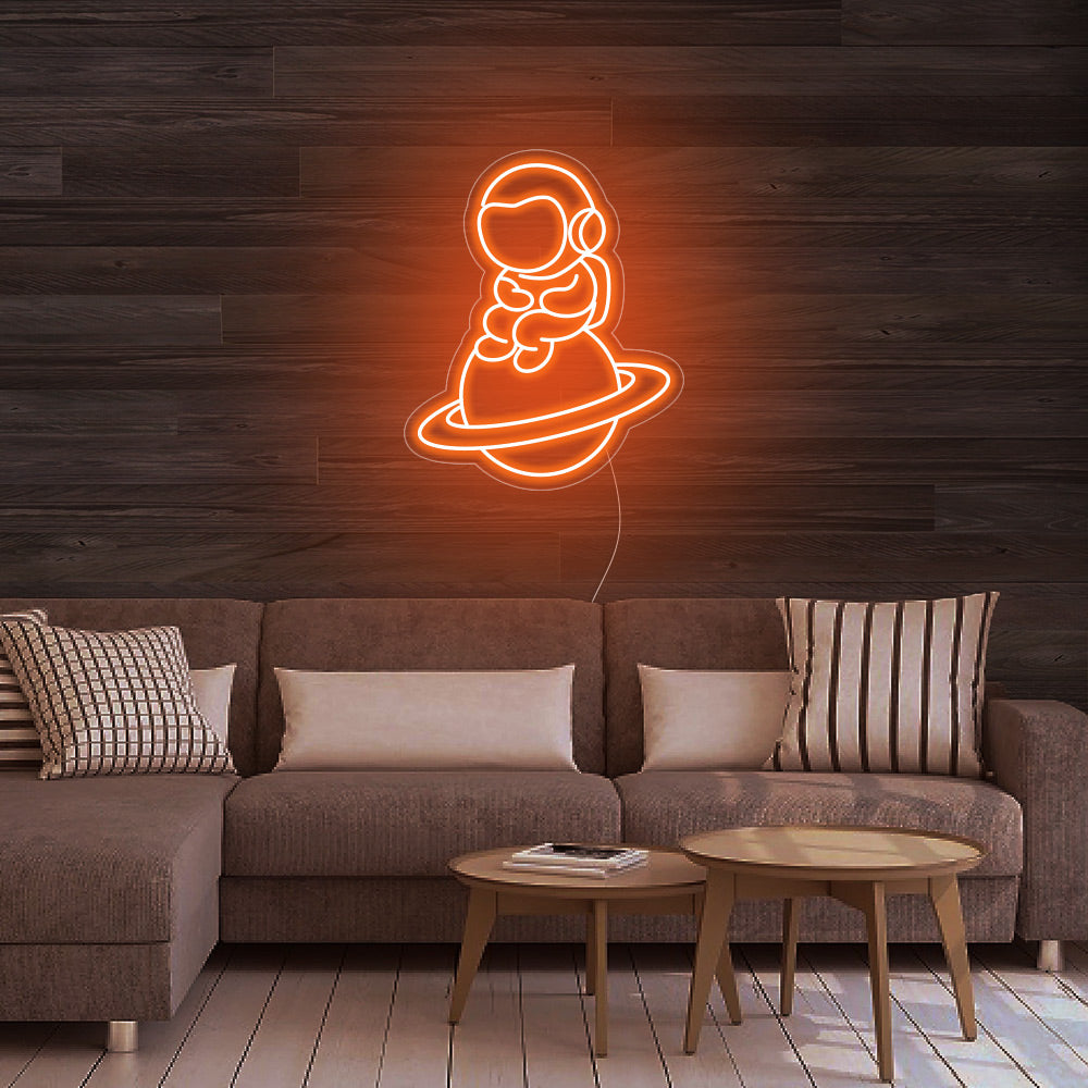 Astronaut Sitting on Planet - LED Neon Sign